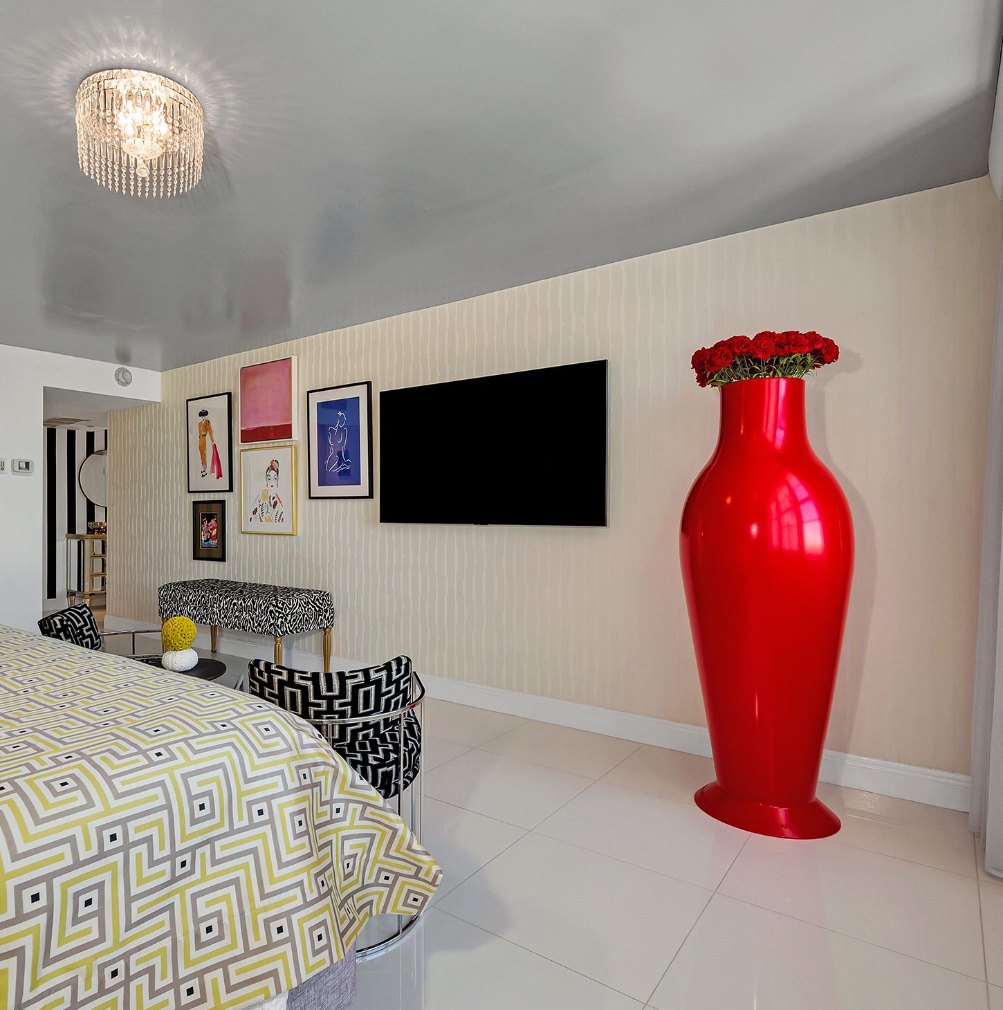 My bedroom gallery wall with an oversized red vase