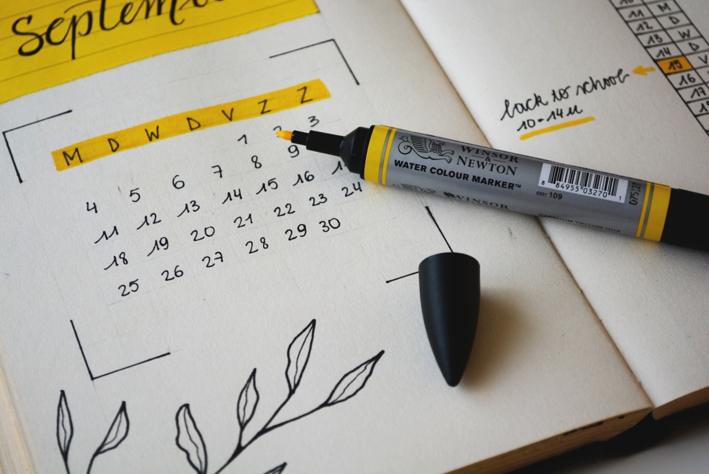 Paper calendar with a closing date marked in bright yellow