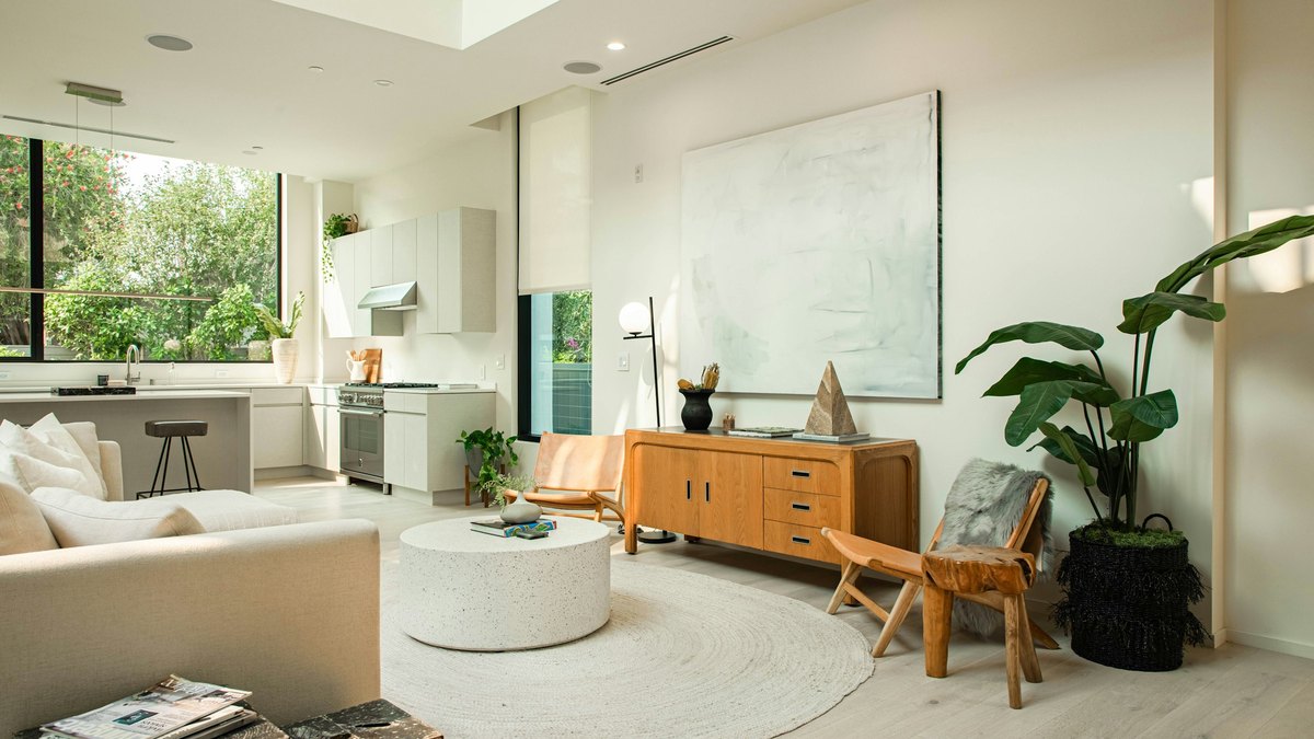 A bright, polished living room prepared for a home showing