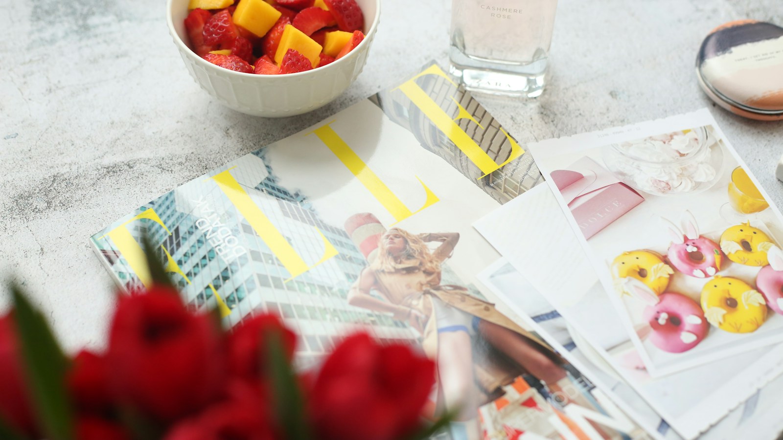 Bowl of sliced watermelon and mango on a bright table